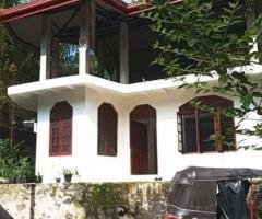 A house is for sale in Polgolla ,Kandy . (20P)