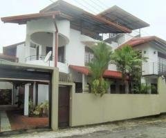Three story modern house with  brick walls for Sale at Piliyandala