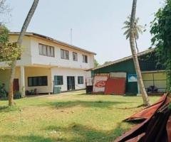 Land with Two story building Facing Bolgoda Lagoon to be sold in Moratuwa.