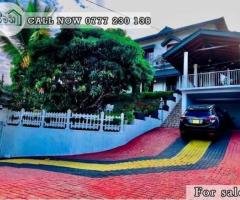 A Two story house is for sale in Peradeniya .