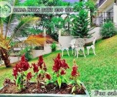 A Two story house is for sale in Peradeniya .