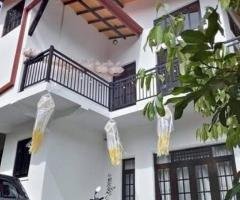 A Two story house is for sale in Peradeniya